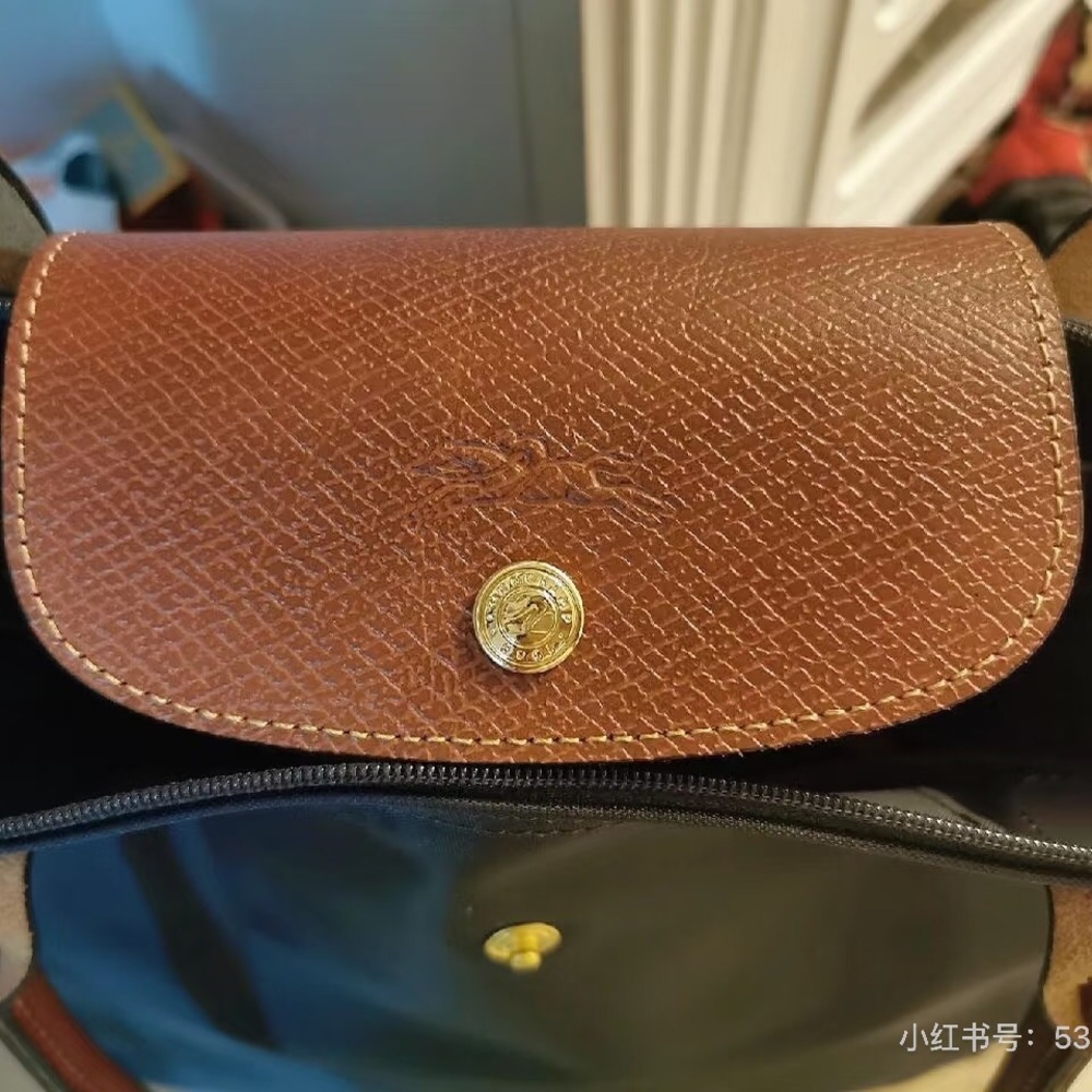 Longchamp Black Tote with Brown Trim and Tan Plush Charm - Picture 4 of 6